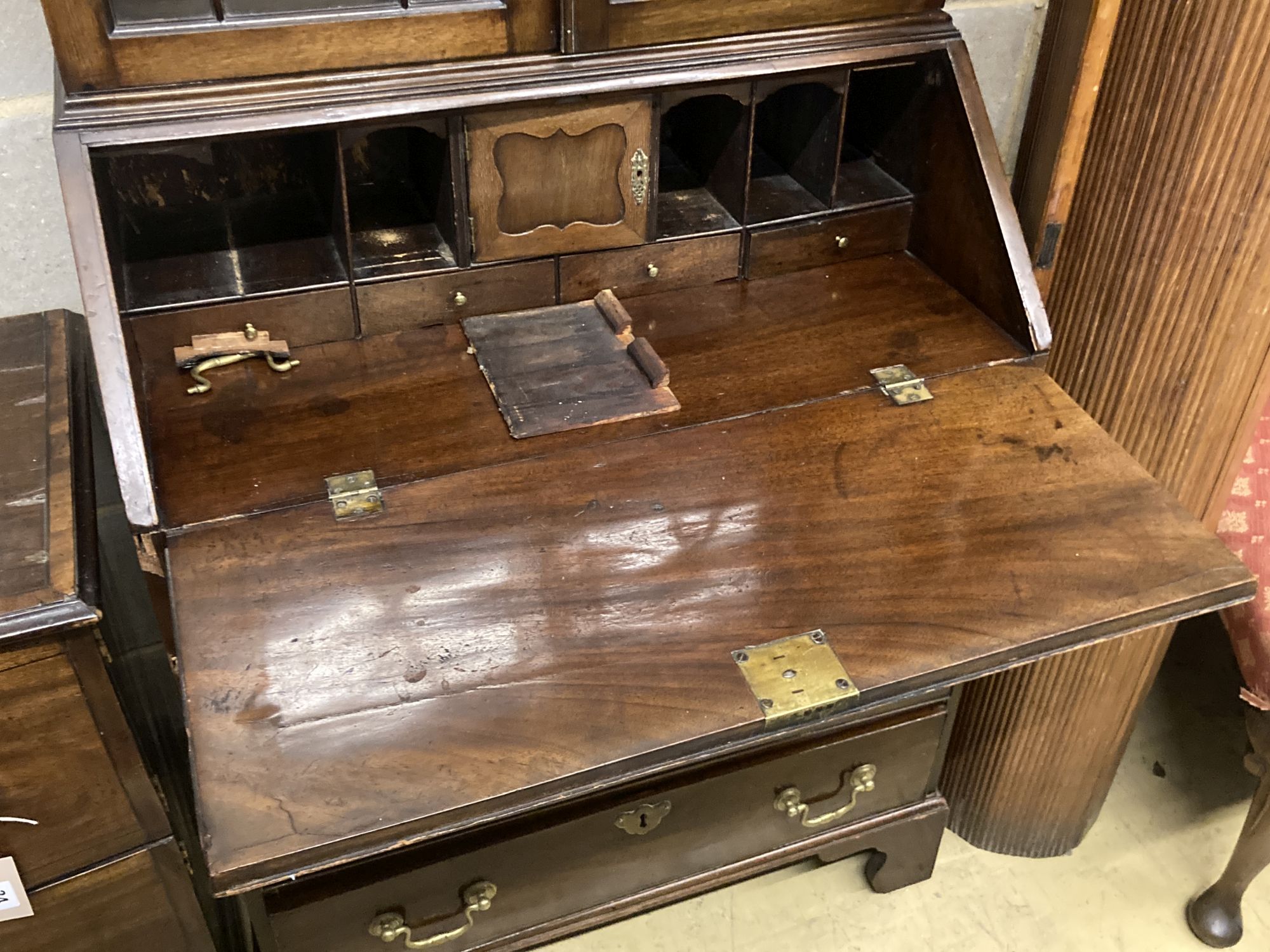 A Georgian style narrow mahogany bureau bookcase, width 76cm depth 44cm height 191cm